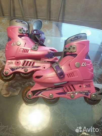 Роликовые коньки