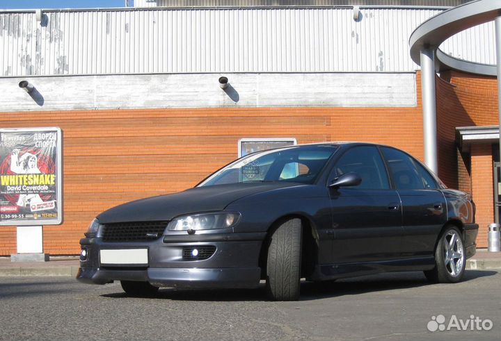 Накладки на пороги Steinmetz Opel Omega B