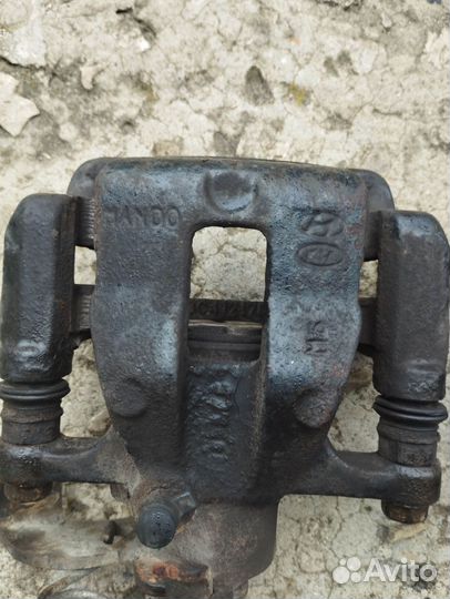 Суппорт задний левый KIA RIO 3 2011-по н.в