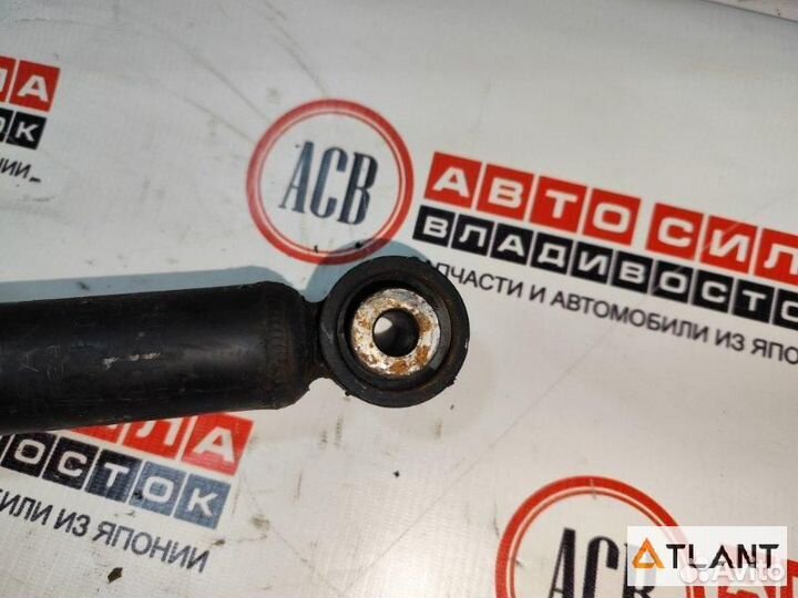 Стойка передняя левая nissan bluebird