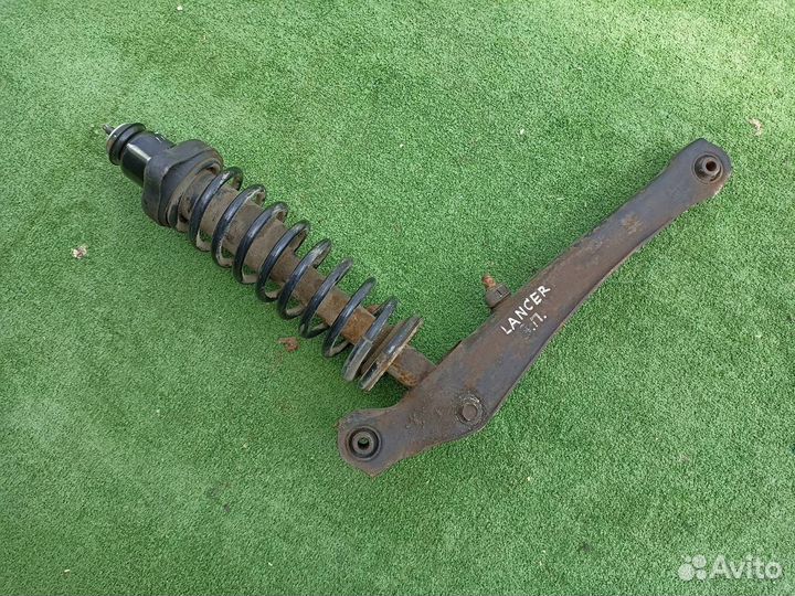 Стойка в сборе задняя Mitsubishi Lancer 9