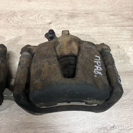 Суппорт передний Opel Corsa d