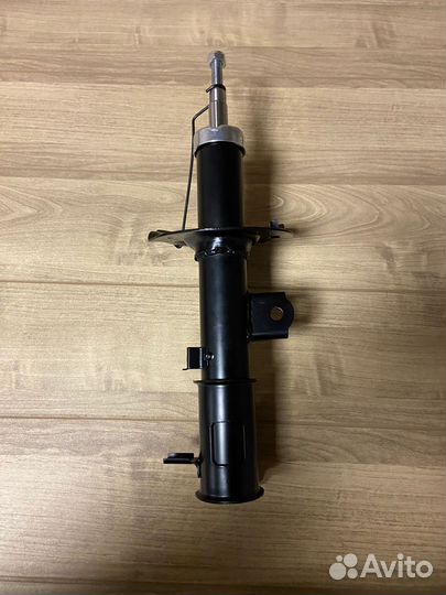 Амортизатор передний левый на Solaris 1 / Rio 3