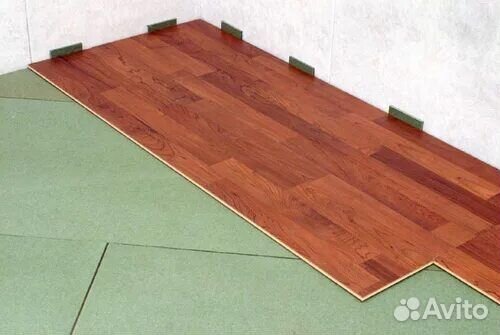 Укладка ламината и установка плинтуса