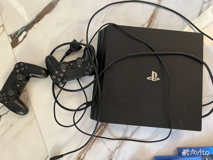 Игровая приставка ps4 pro 1000гб