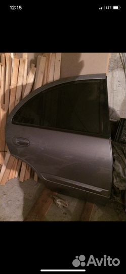Задняя правая дверь на ниссан алмера classic