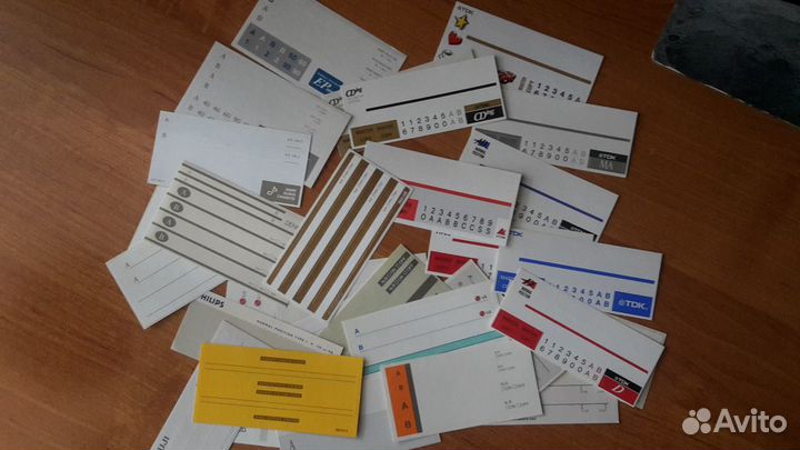 Наклейки от кассет 29 штук разных
