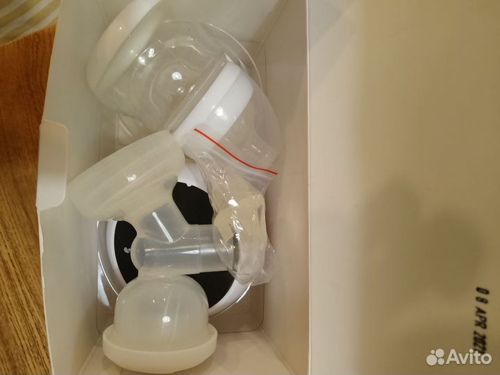 Молокоотсос электрический