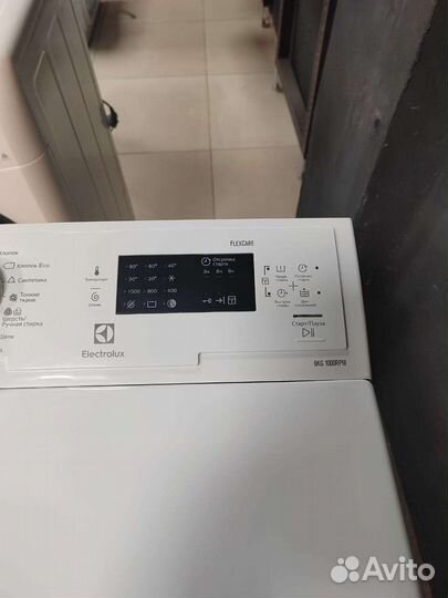 Стиральная машина с вертикальной загрузкой