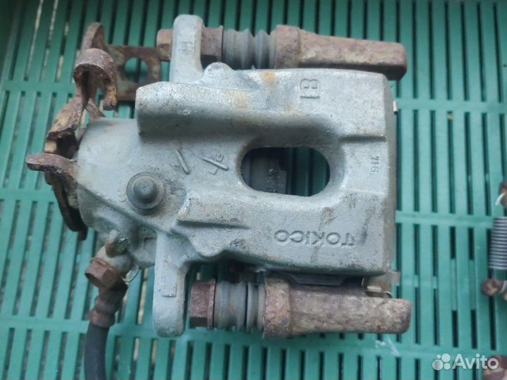 Суппорта задние Тойота Королла e 15