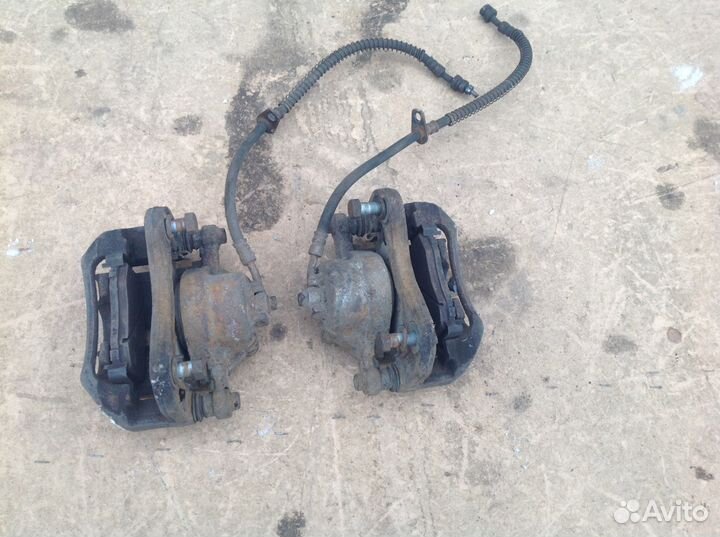 Суппорт передний правый левый Киа Рио 2