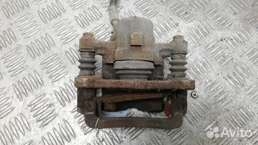 Суппорт тормозной задний левый toyota corolla E12