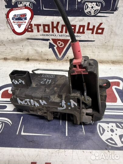 Замок двери задней левой Opel Astra H