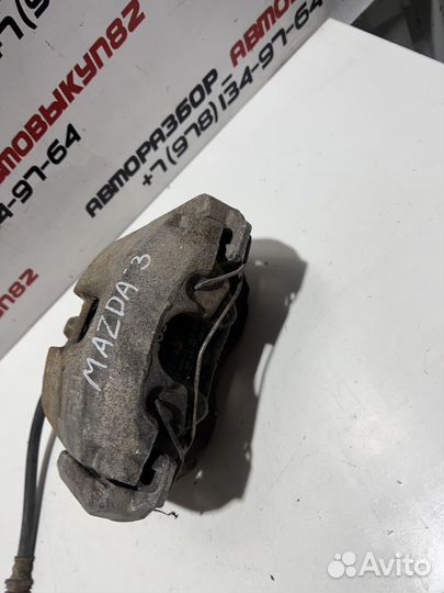 Суппорт передний правый левый Mazda 3 BK