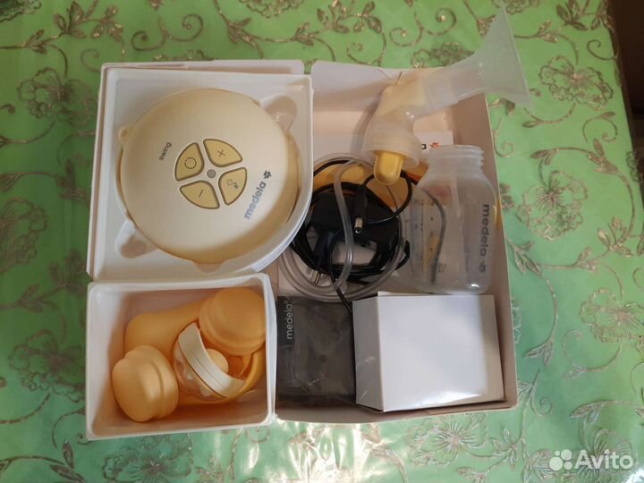 Молокоотсос medela swing электрический