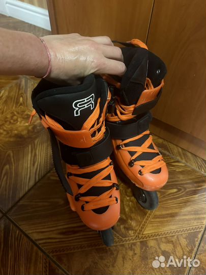 Роликовые коньки