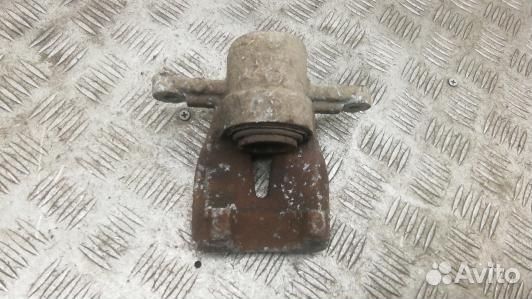 Суппорт тормозной задний левый toyota avensis T25