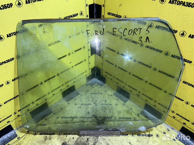 Стекло боковое заднее левое Ford escort 5