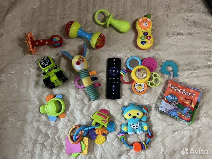Детские игрушки и погремушки