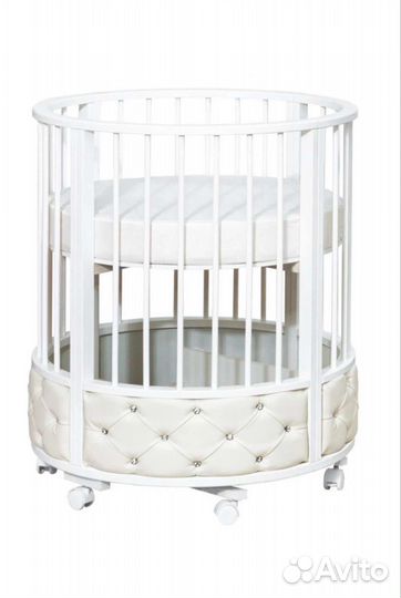 Детская кроватка с маятником