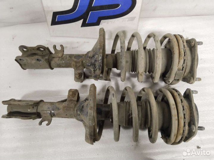 Стойки передние Kia Spectra