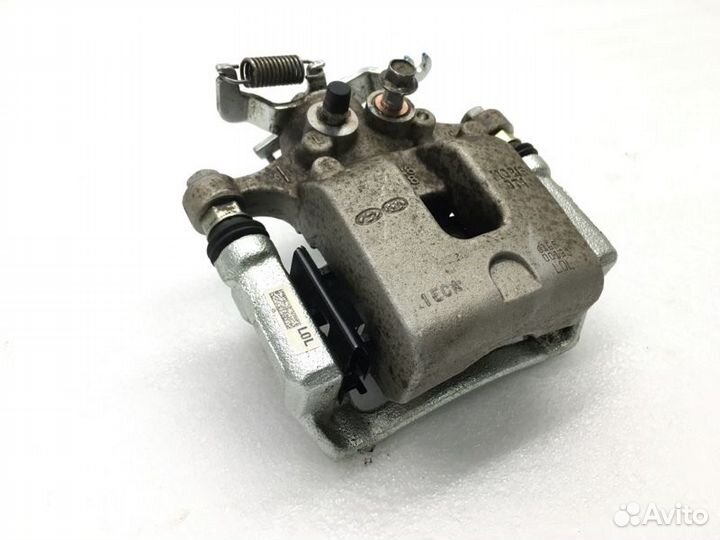 Суппорт задний левый Kia K5 DL3 2.0 2021