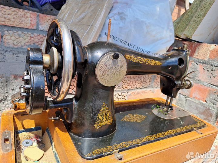 Швейная машина Singer