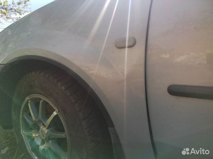 Крыло переднее правое Renault Logan 1.6 K7M 710