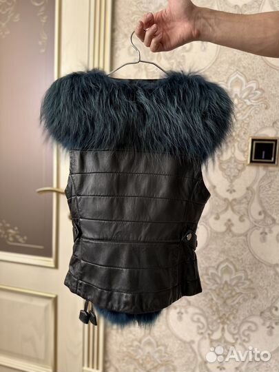 Жилетка меховая женская