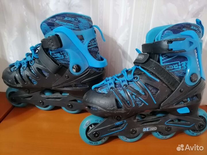 Роликовые коньки