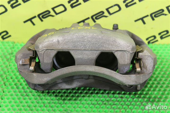 Суппорт тормозной передний левый Nissan Leaf ZE0