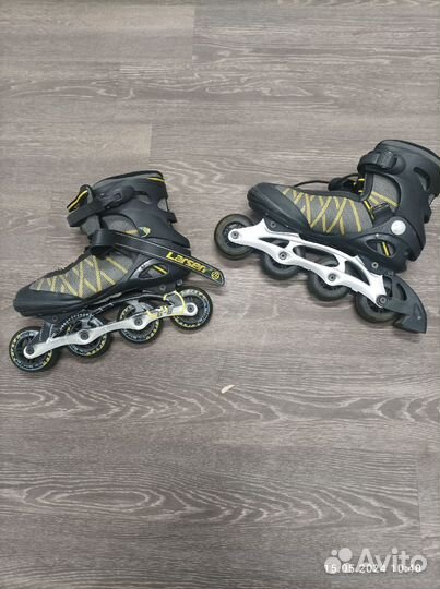 Роликовые коньки