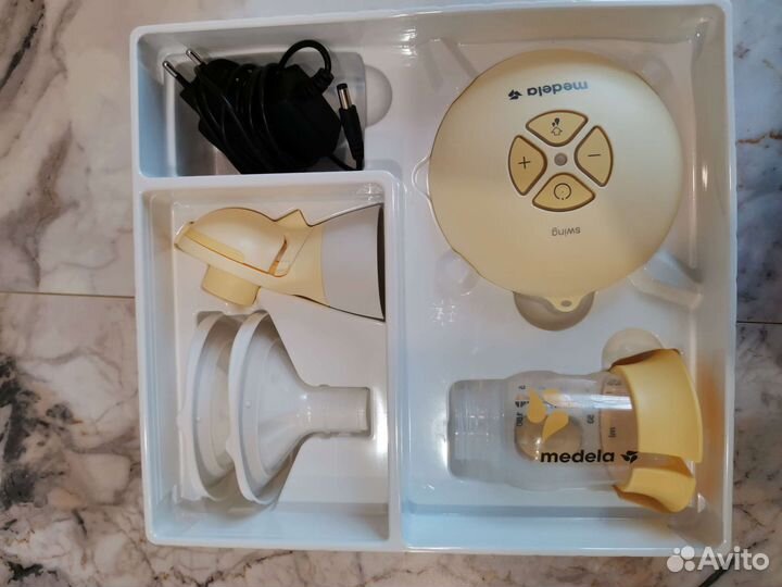 Молокоотсос medela swing flex