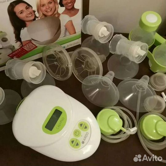 Молокоотсос электрический новый