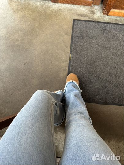 Джинсы клеш с разрезами