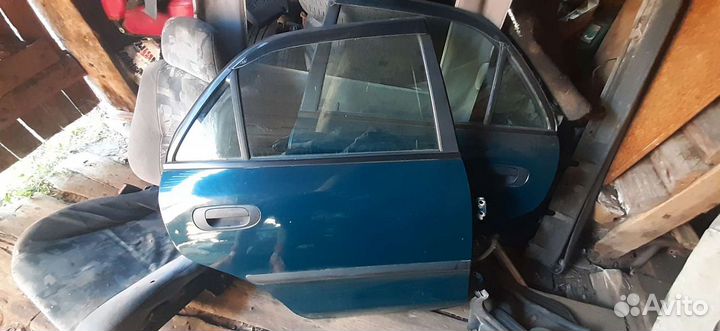 Дверь передняя, задняя Mitsubishi Carisma