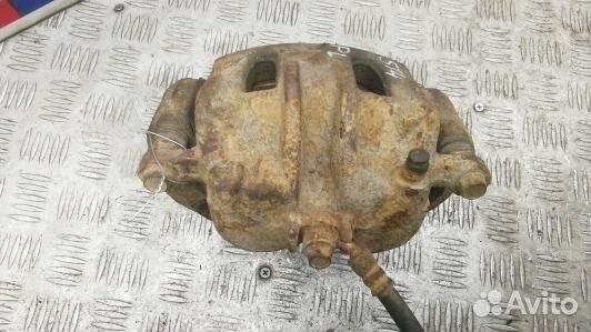 Суппорт тормозной передний левый KIA sorento 2 (4S