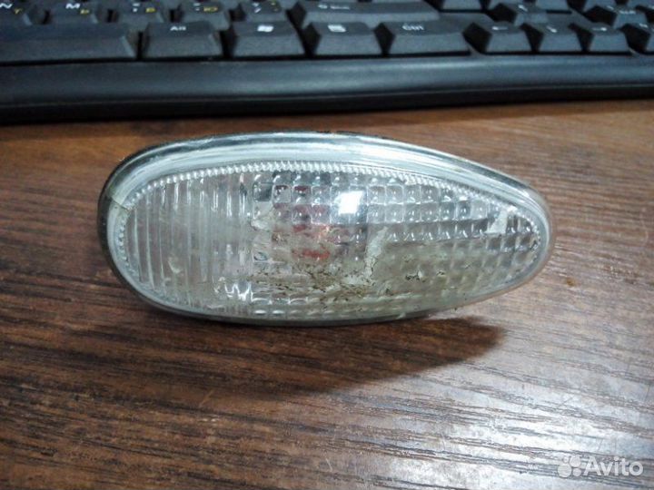 Указатель поворота передний Mitsubishi Outlander