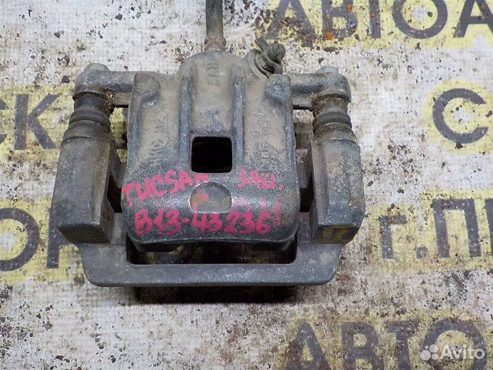 Суппорт задний левый Hyundai Tucson (JM) 2004-2009