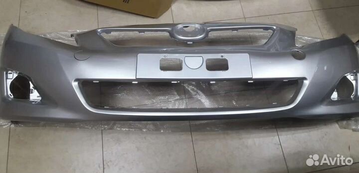 Передний бампер Toyota Corolla E 150 серебристый