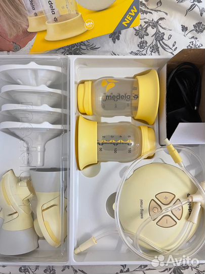 Молокоотсос medela электрический