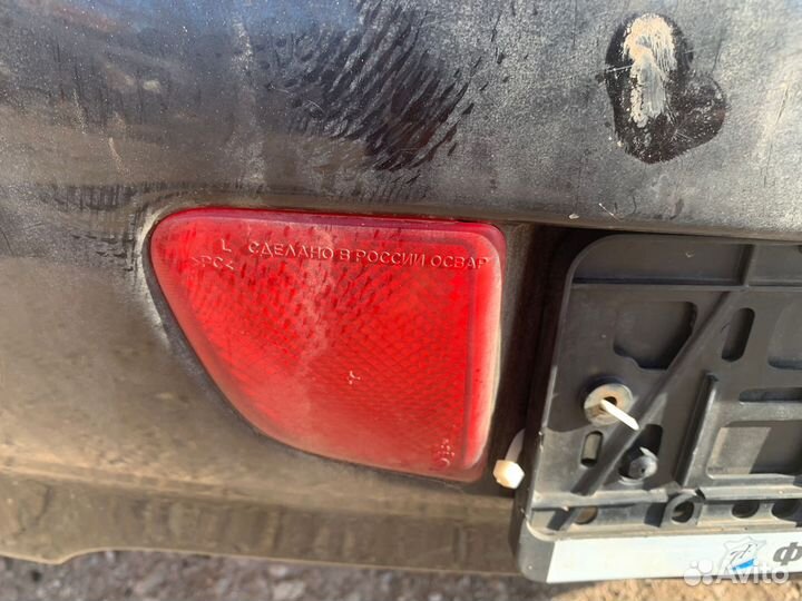 Фонарь задний противотуманный левый Kia Spectra