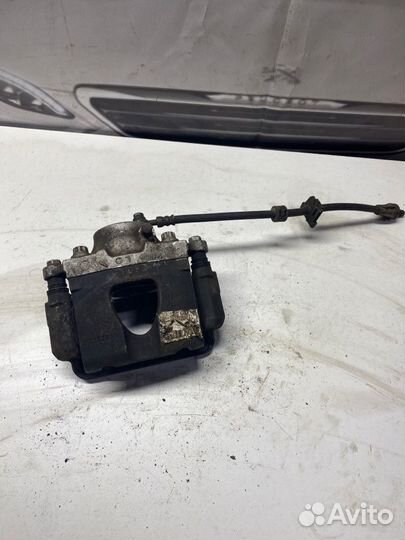 Суппорт тормозной передний левый Peugeot 308 Т9