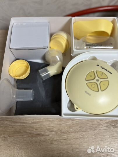 Молокоотсос medela электрический