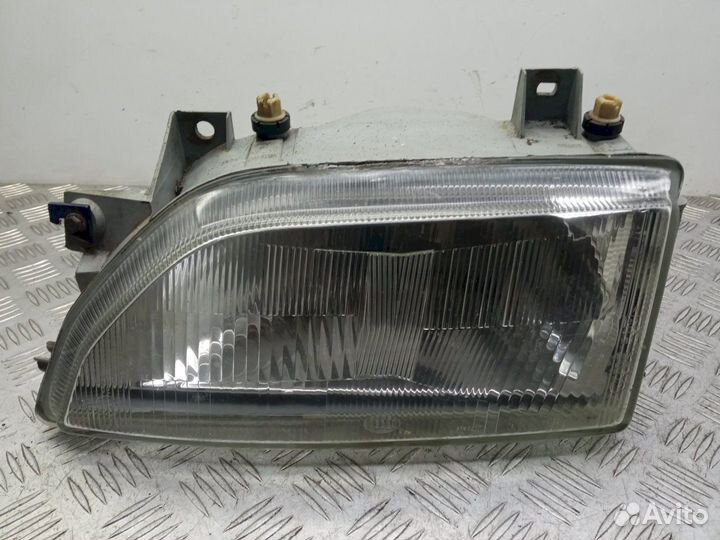 Фара Ford Escort (1990-1995)