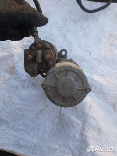 Стартер симбол клио логан 1.4