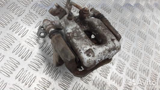 Суппорт тормозной задний левый opel astra K (83S18