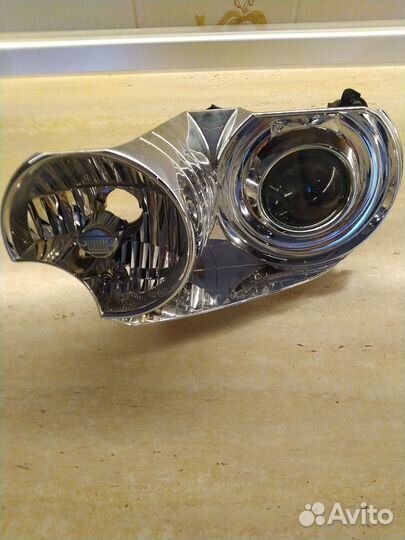 Фара левая джип гранд чероки wk2