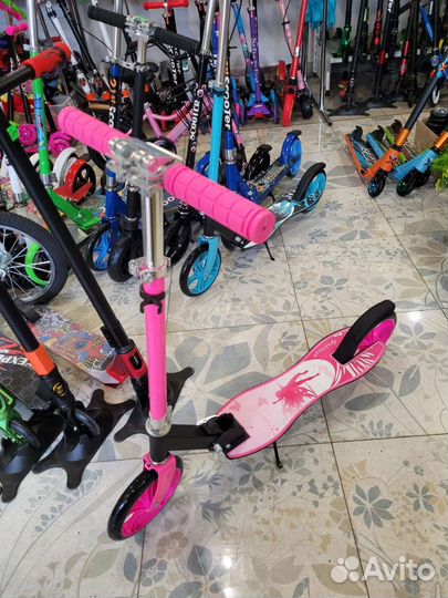 Новые подростковые самокаты с фигурной платформой