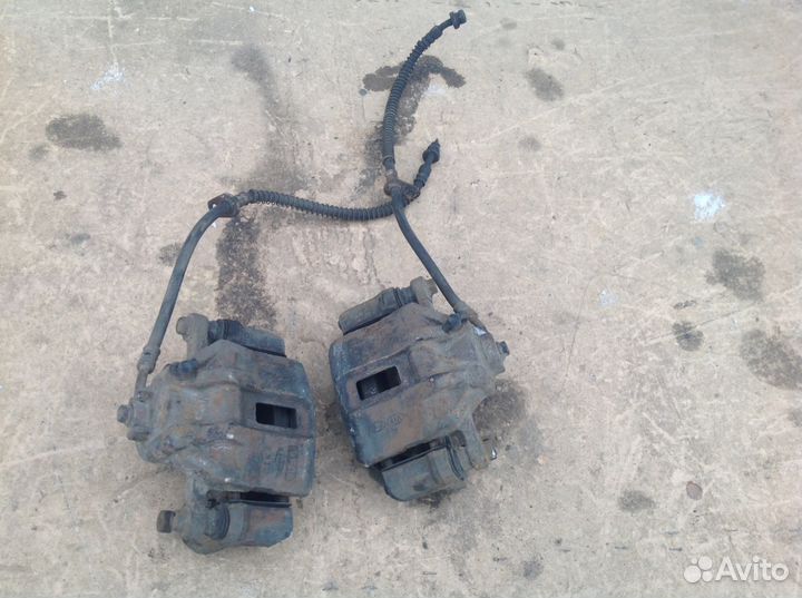 Суппорт передний правый левый Киа Рио 2